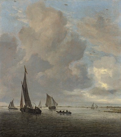 River estuary with wijdschips, a rowing boat and other small vessels